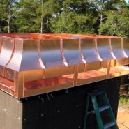 Radius shroud with standing sims in copper